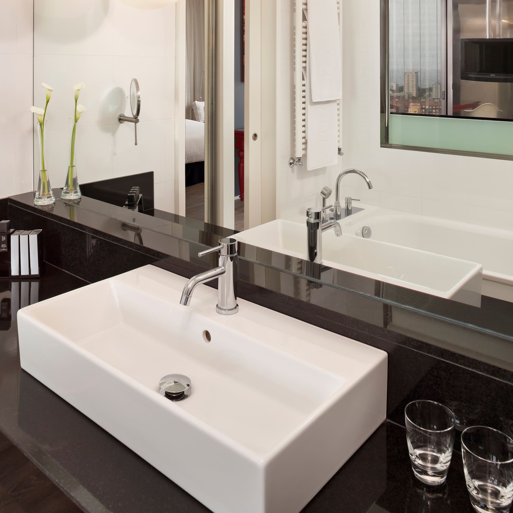 a bathroom with a sink and two sinks