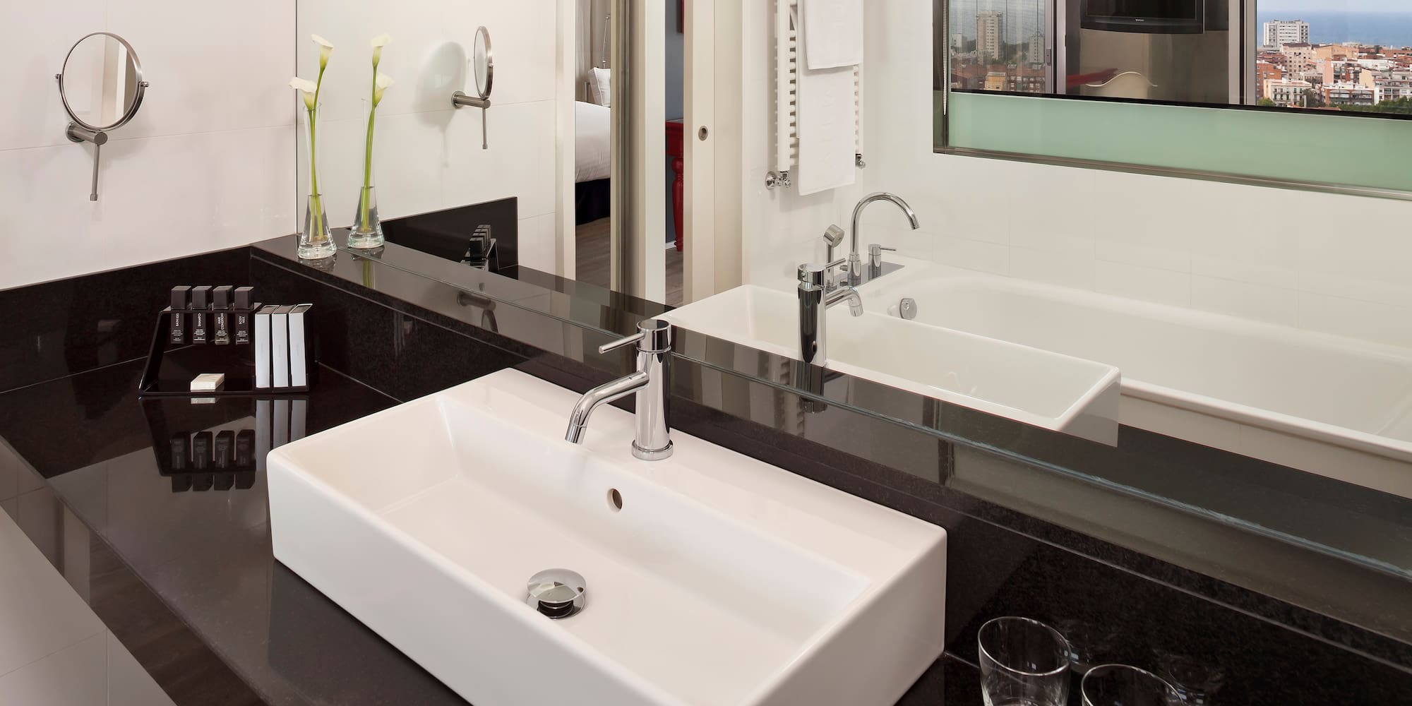 a bathroom with a sink and two sinks