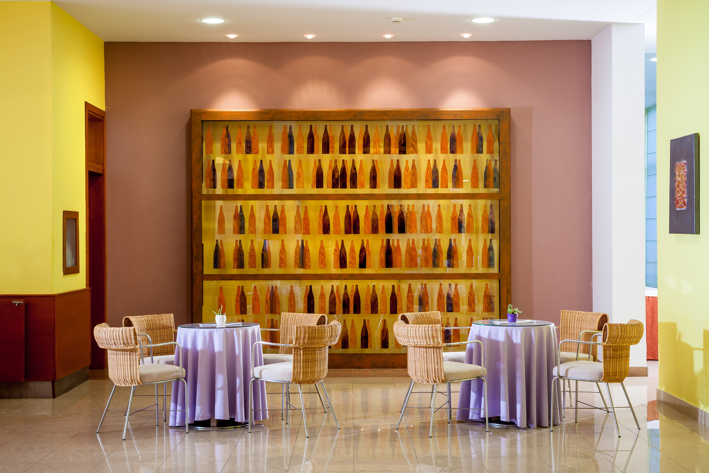 a room with tables and chairs