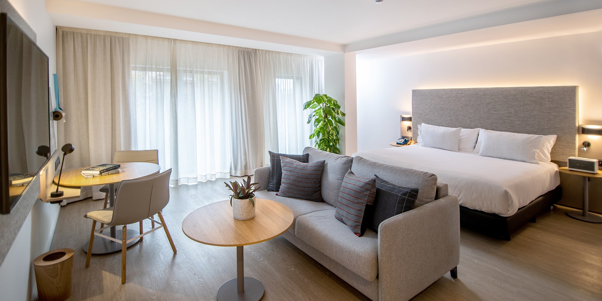 a room with a bed and a table