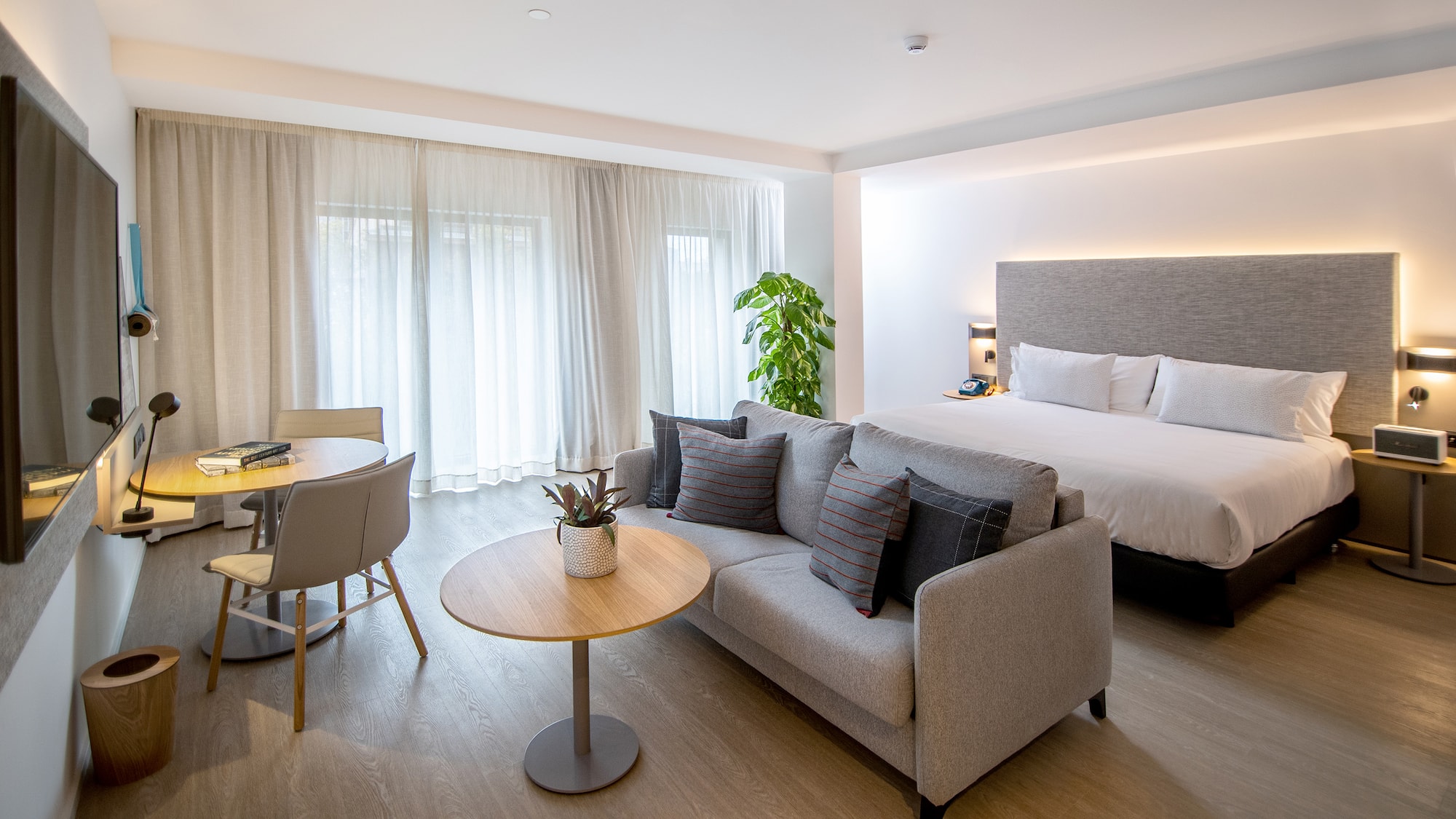 a room with a bed and a table