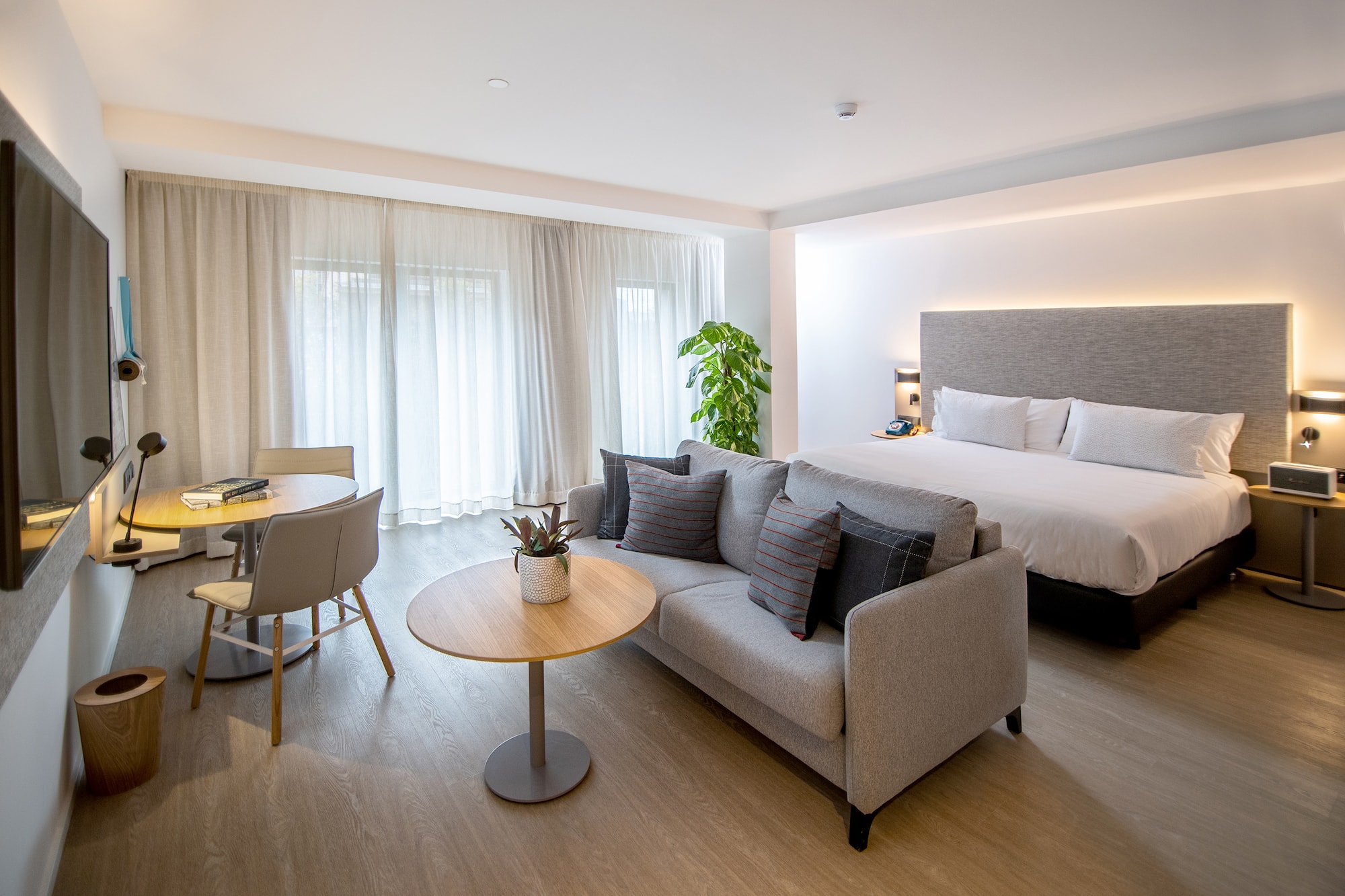 a room with a bed and a table