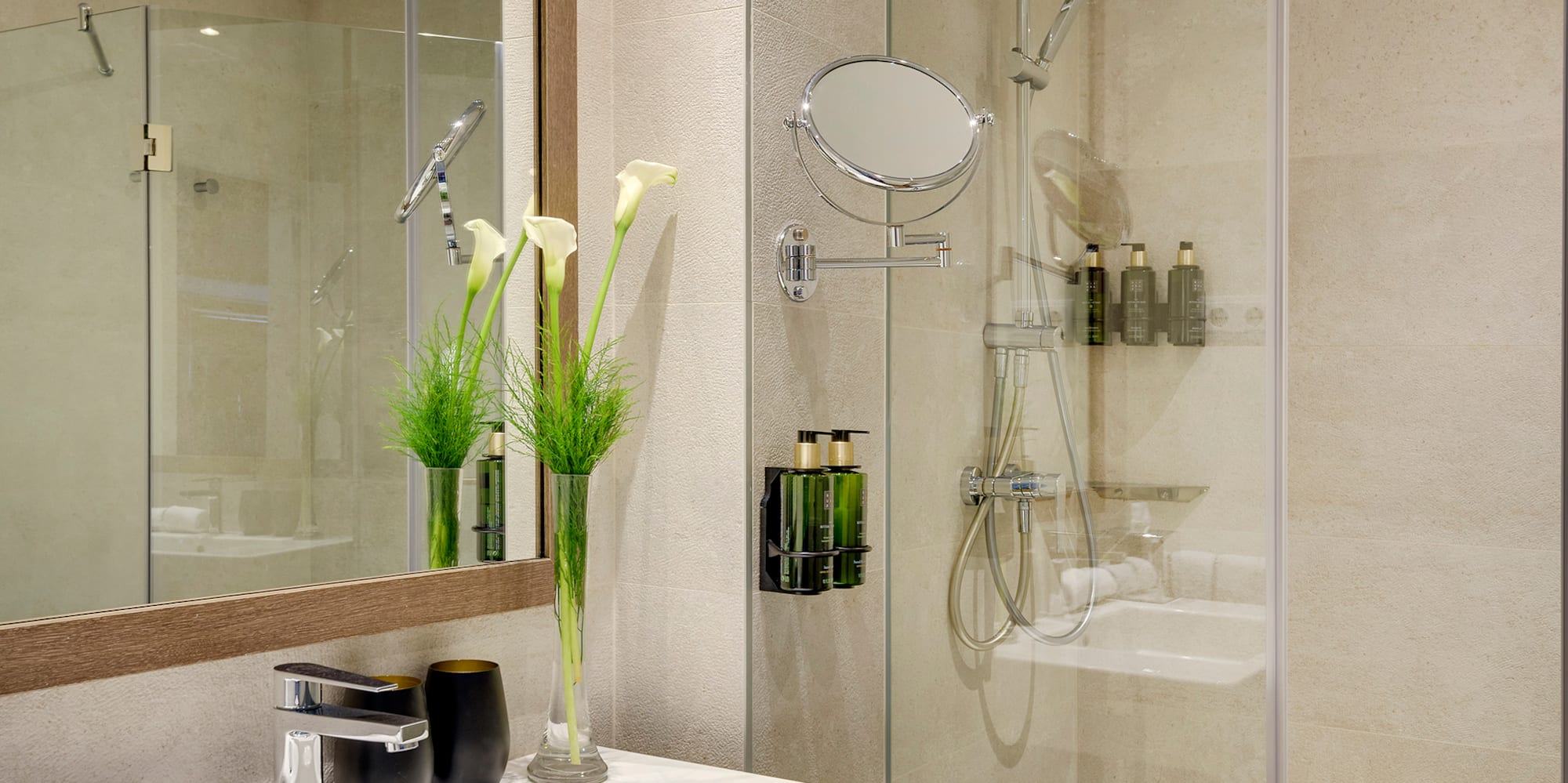 a bathroom with a shower and sink