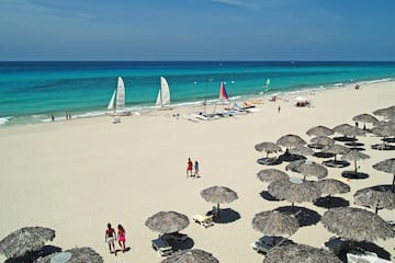 a group of people on a beach