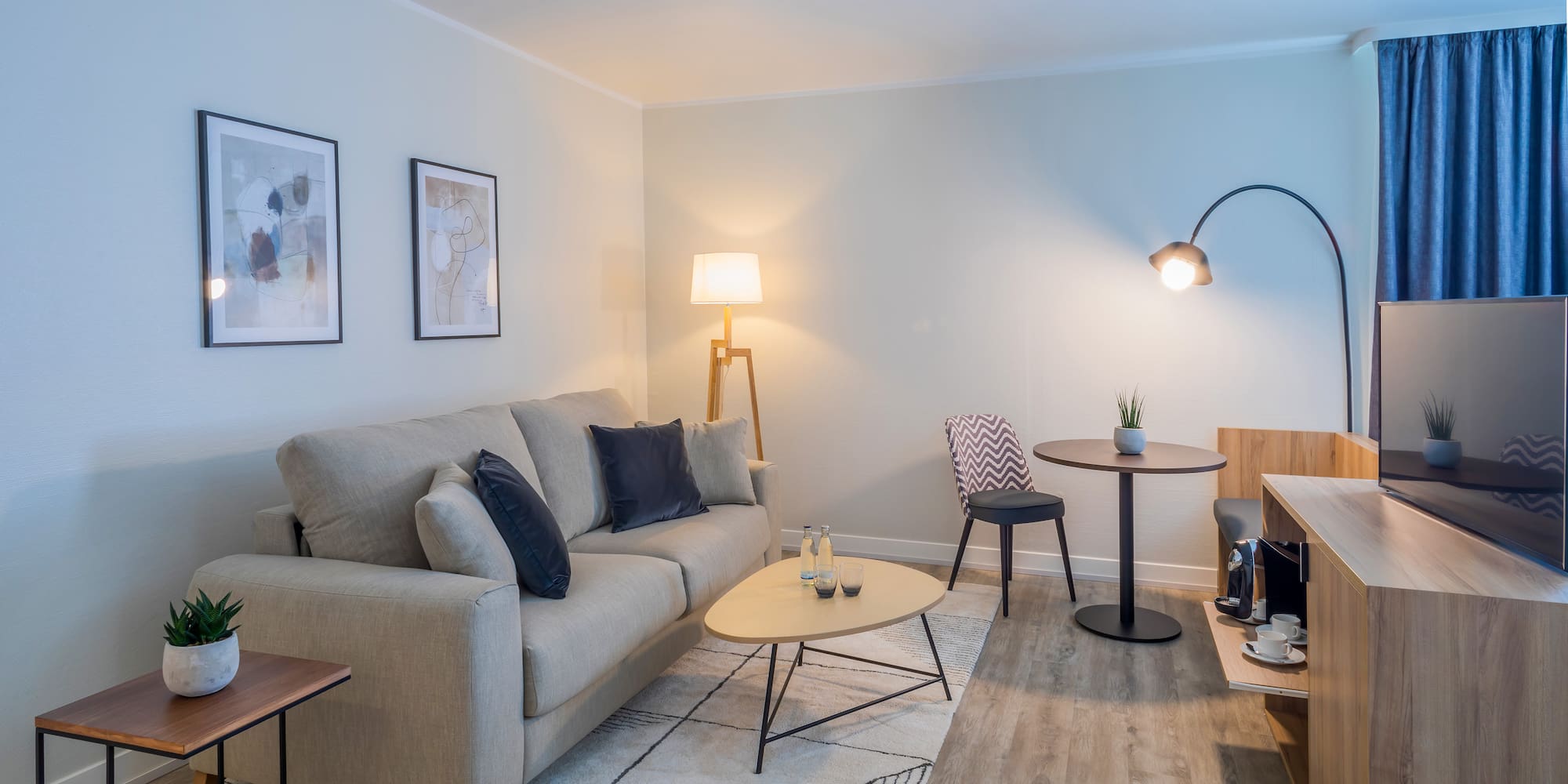 a living room with a couch and table