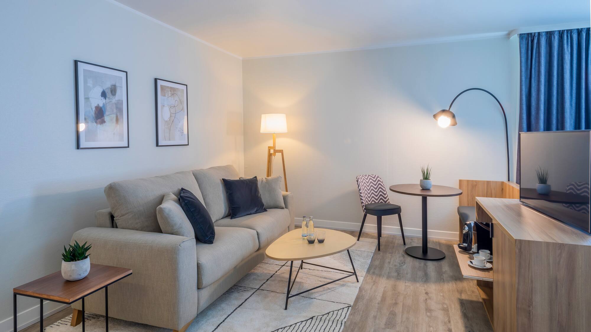 a living room with a couch and table