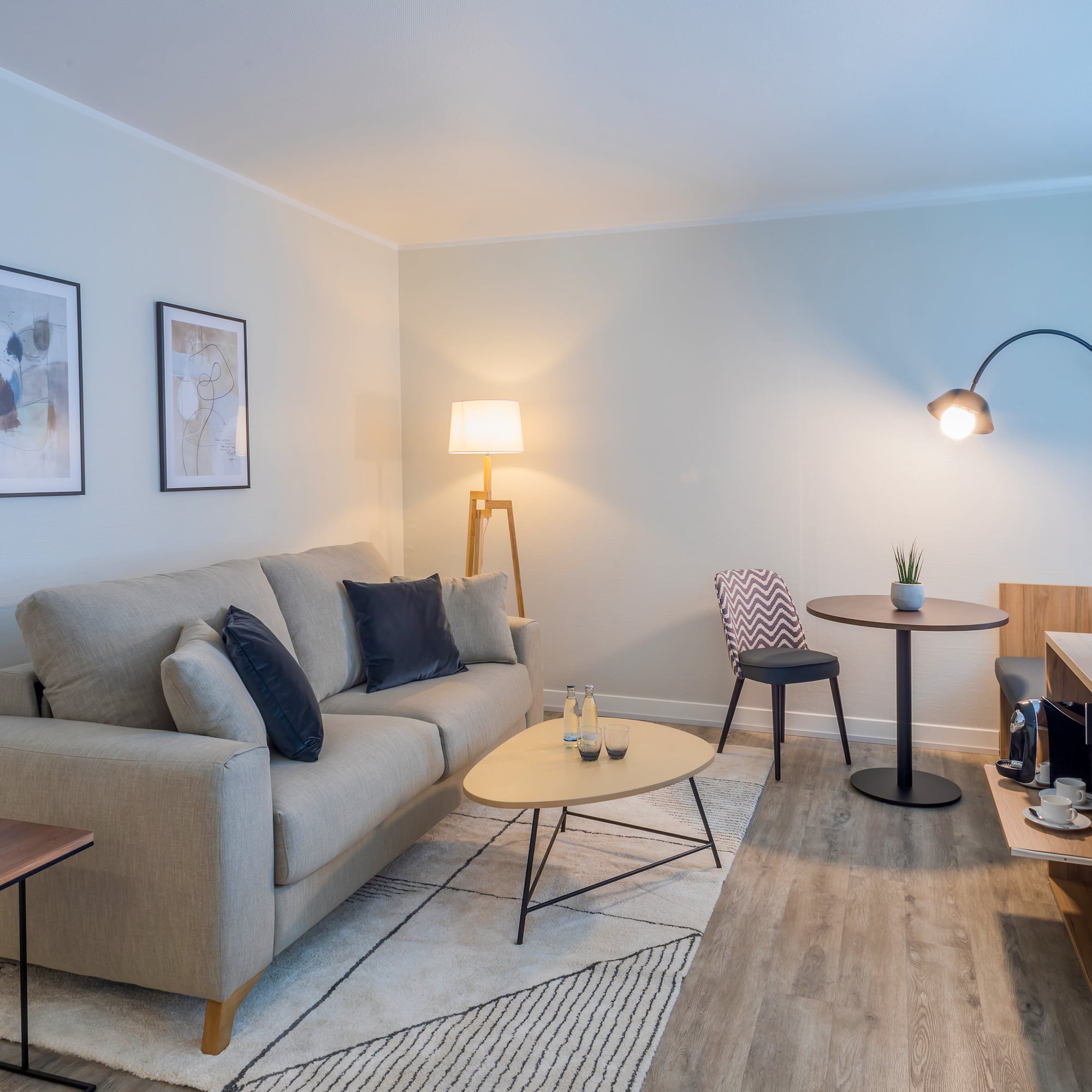 a living room with a couch and table
