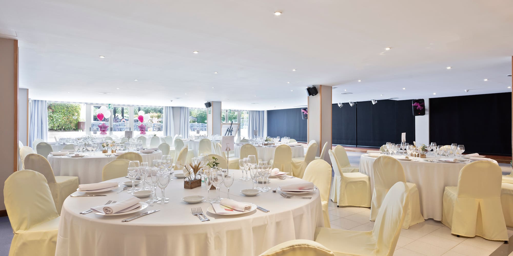 a room with tables and chairs