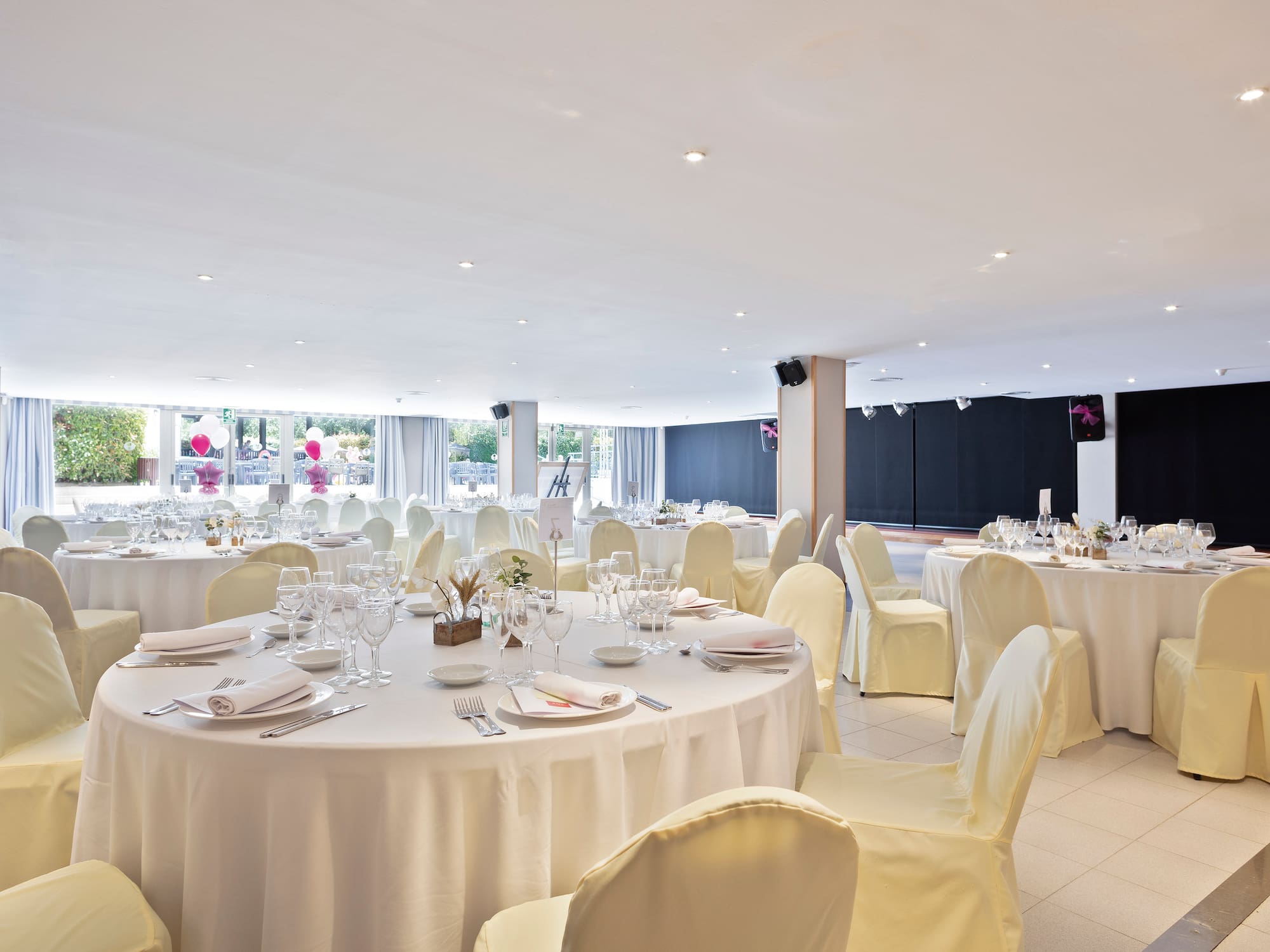 a room with tables and chairs