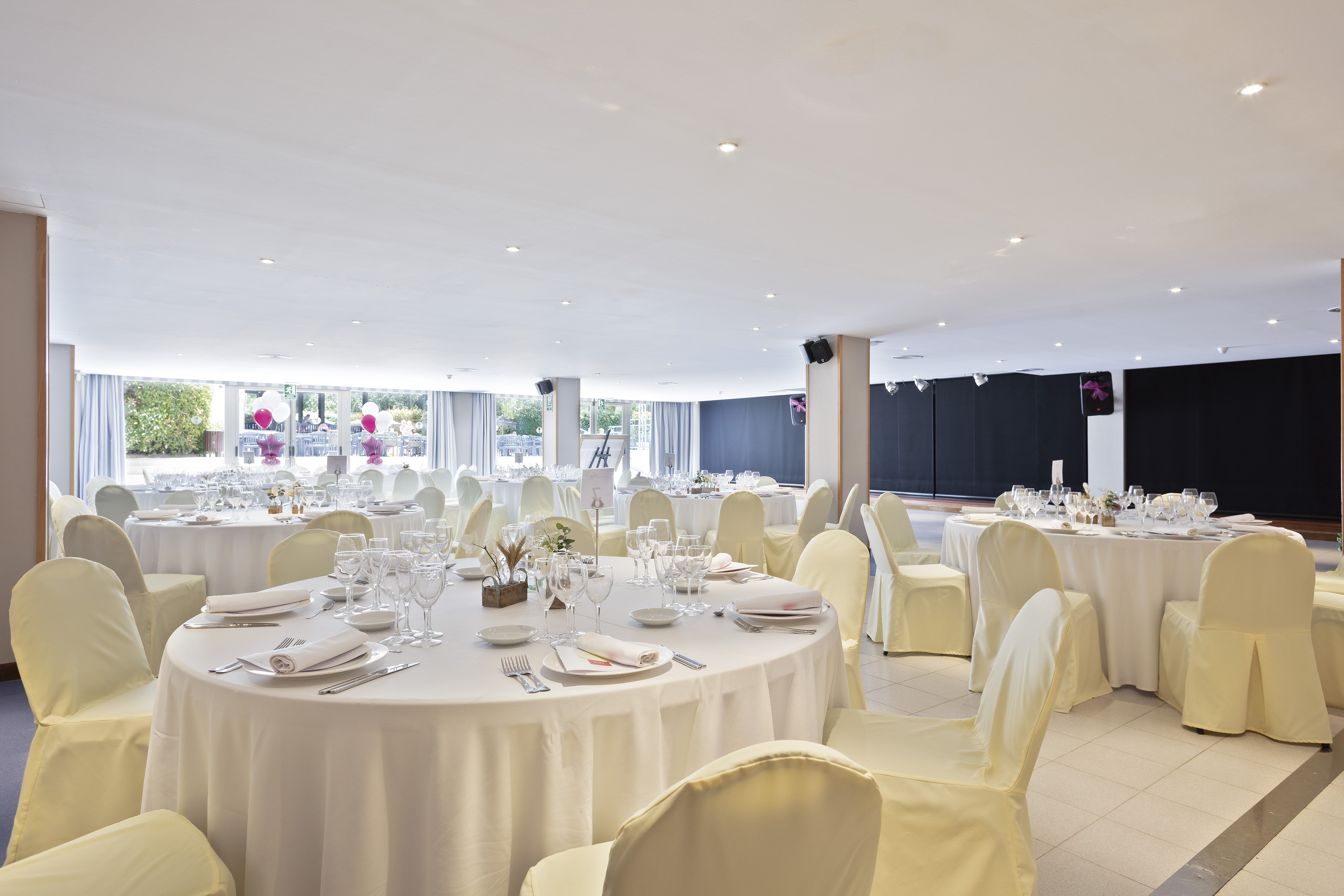 a room with tables and chairs