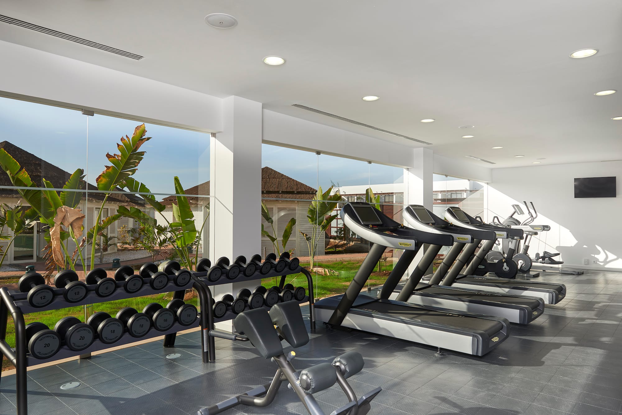 a room with treadmills and exercise equipment