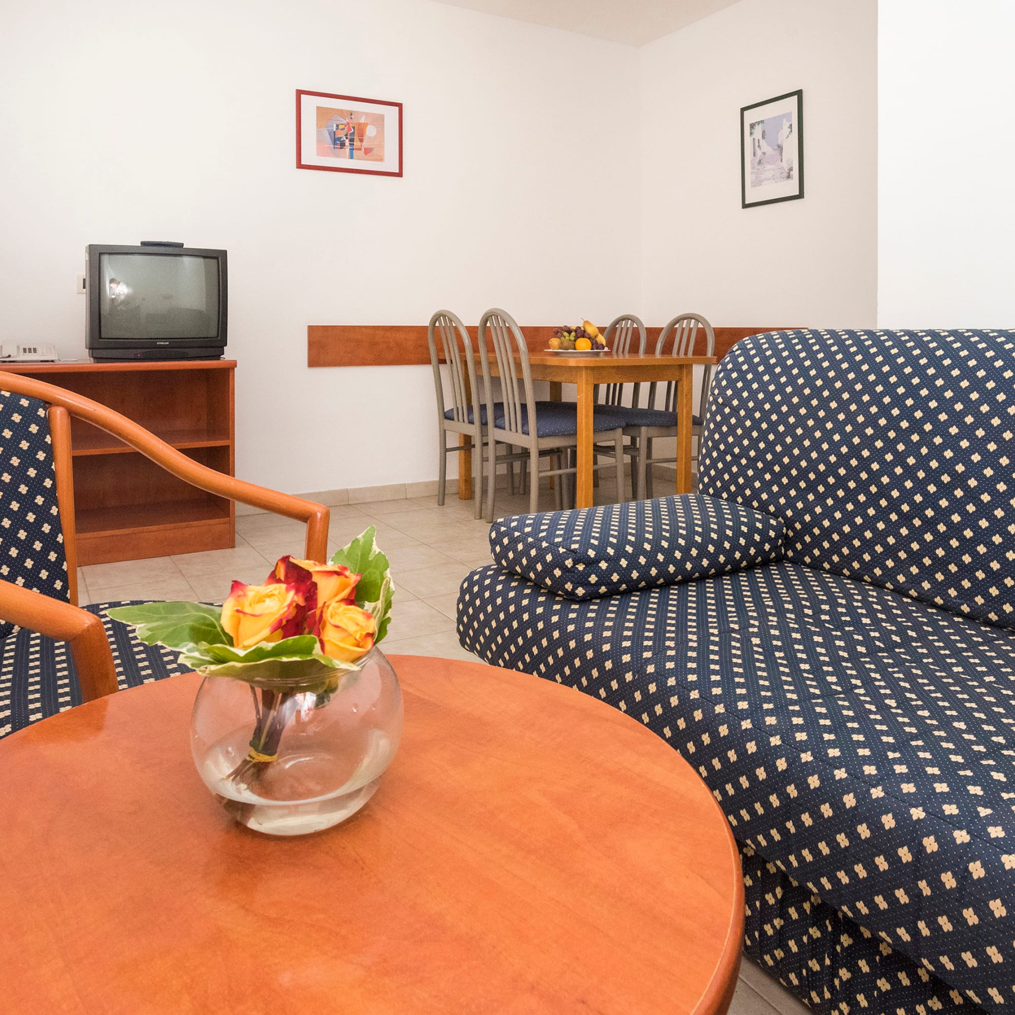 a room with a couch and a television