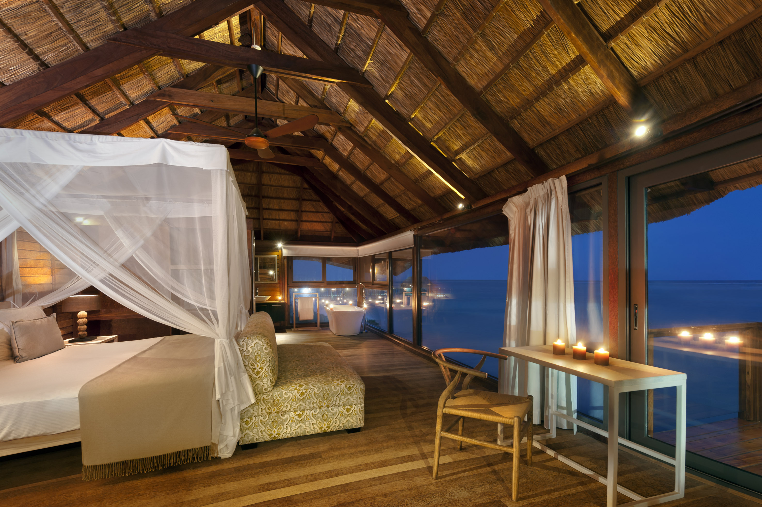 a room with a bed and a window