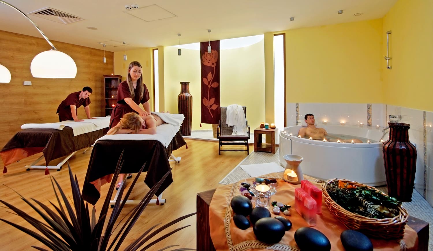 a group of people in a spa room