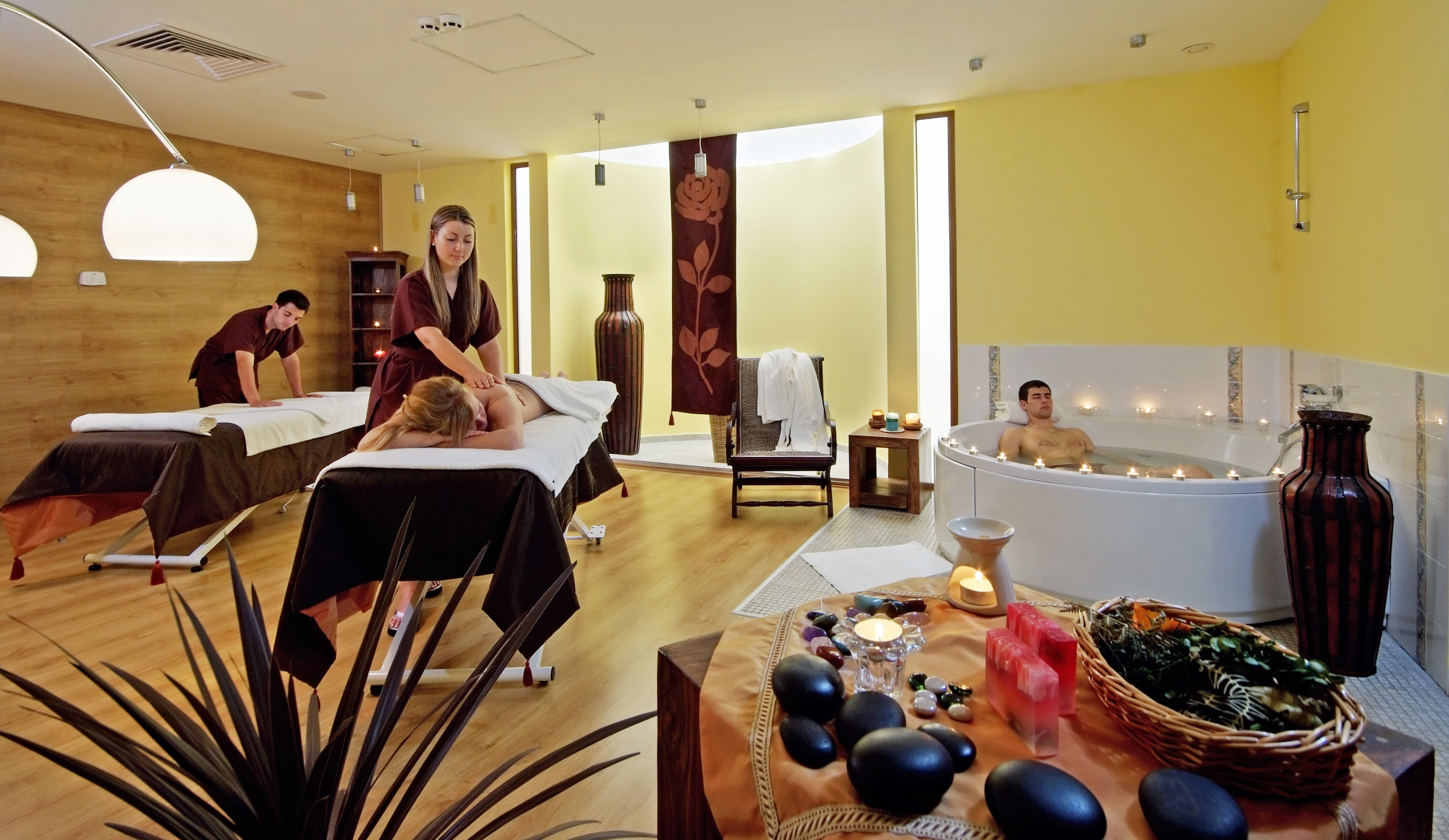 a group of people in a spa room