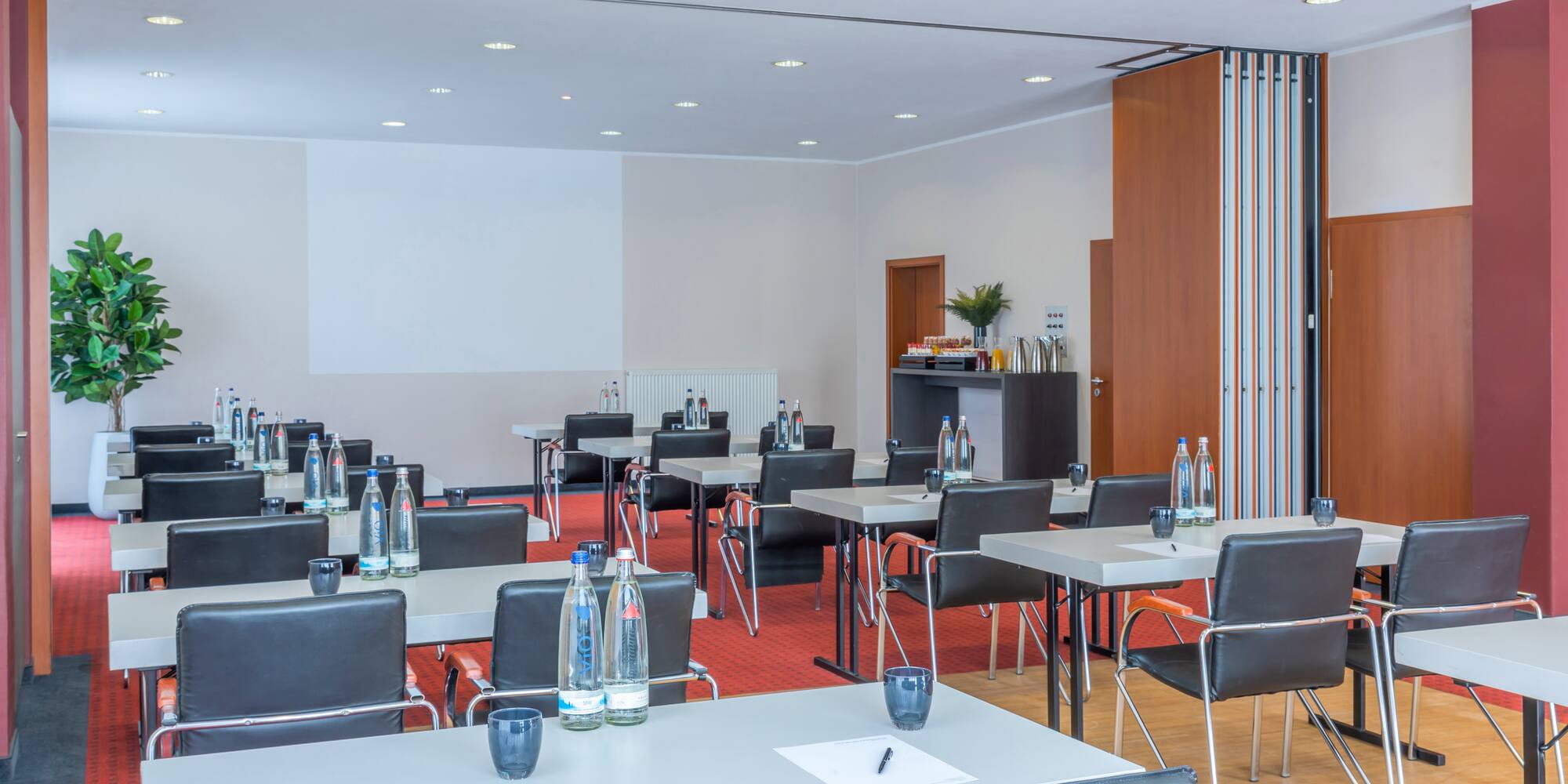 a room with tables and chairs