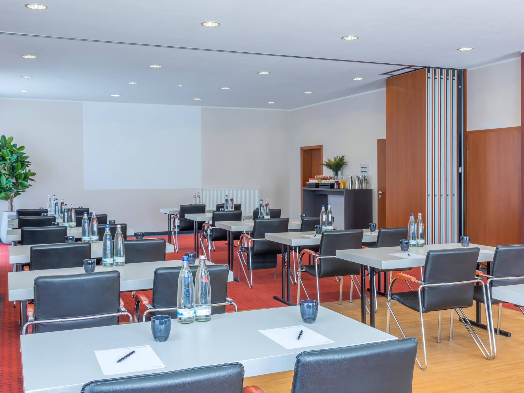 a room with tables and chairs