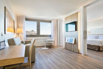 a room with a tv and a table