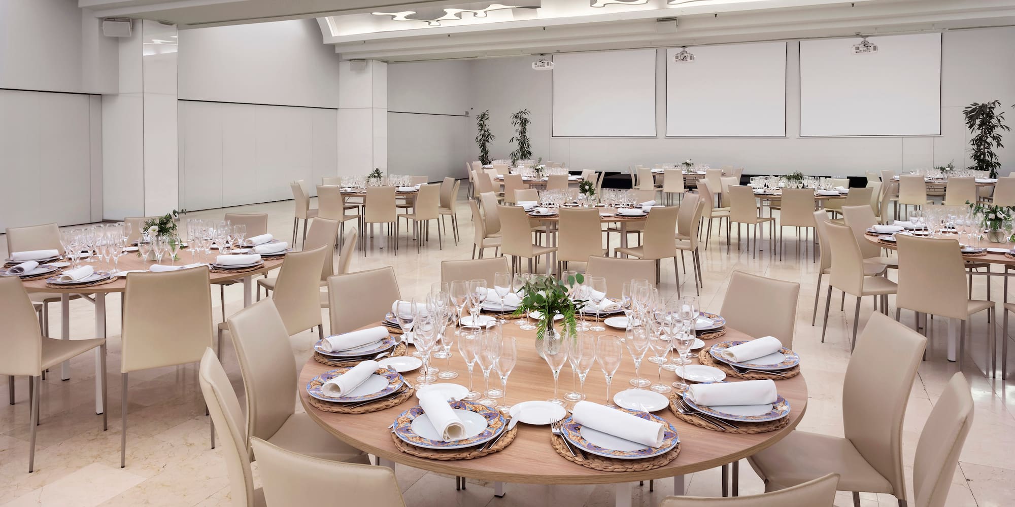 a large room with tables and chairs