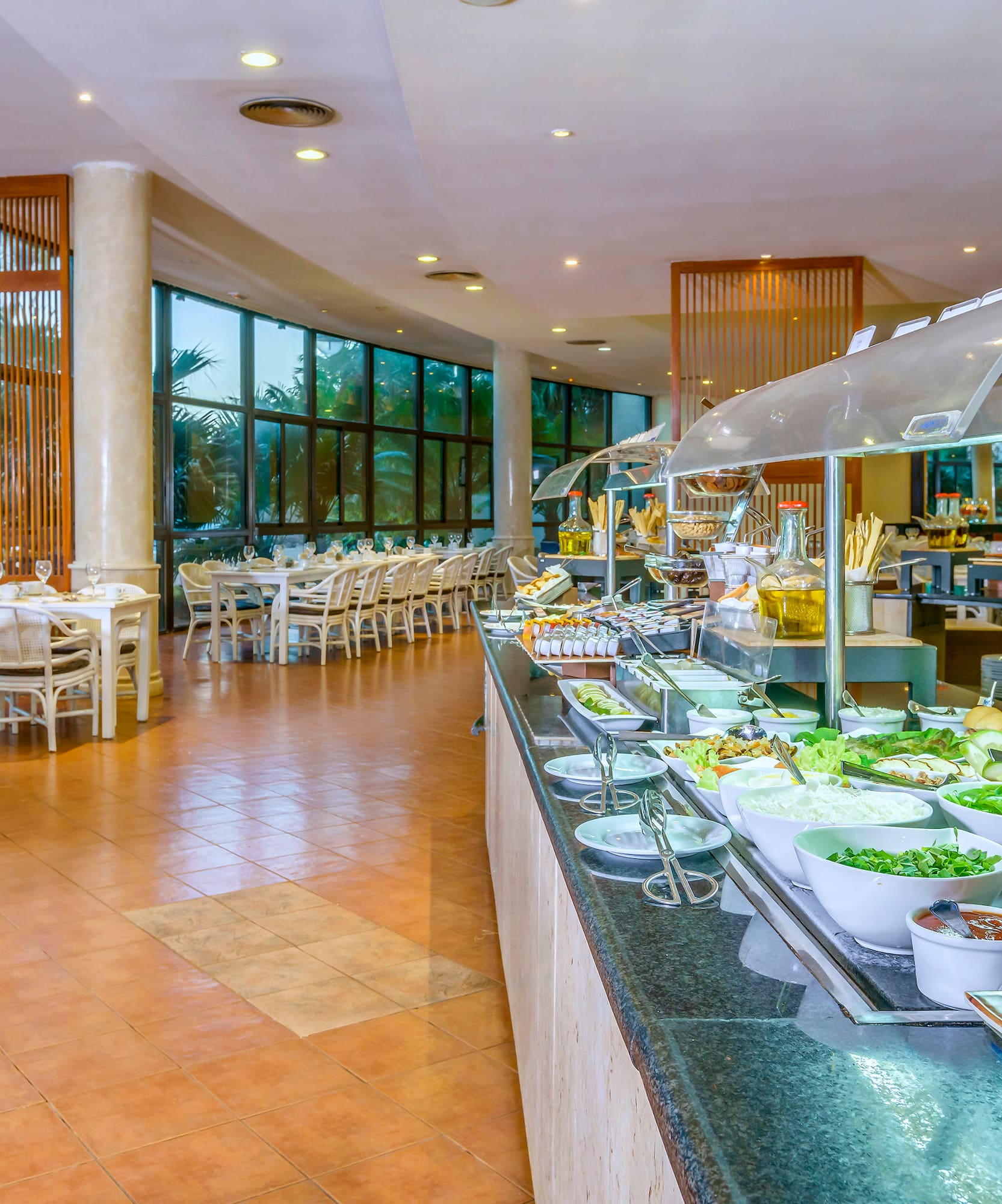 a buffet line with food on the counter