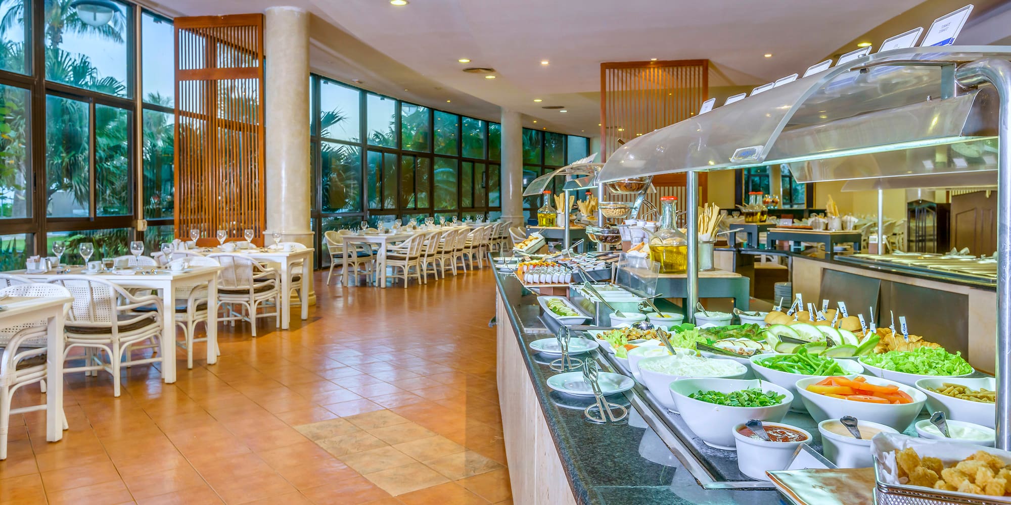 a buffet line with food on the counter