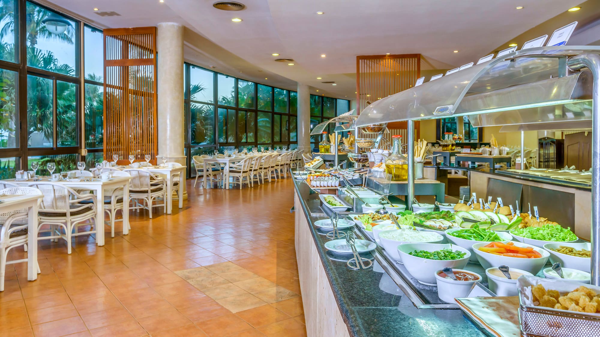 a buffet line with food on the counter
