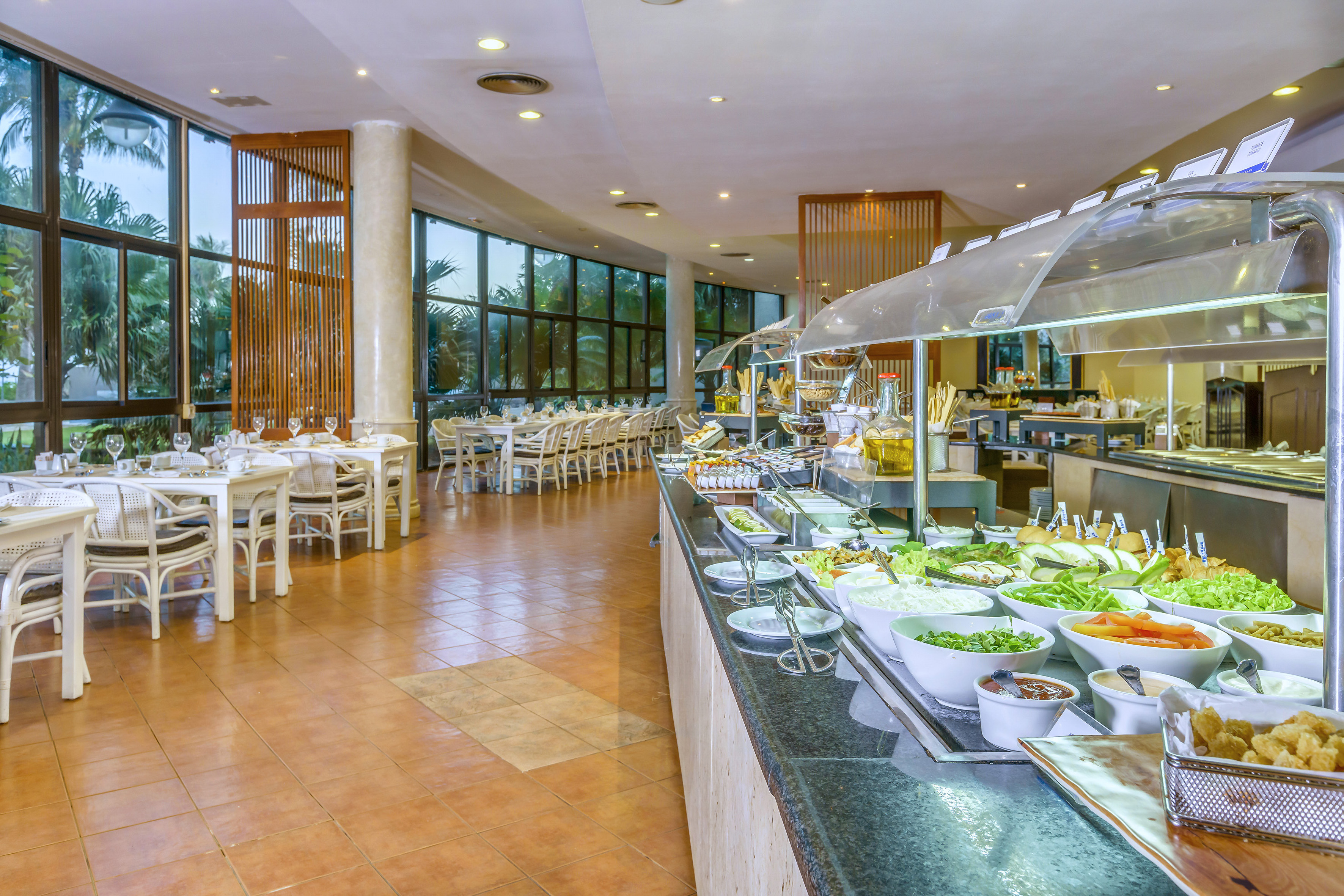 a buffet line with food on the counter