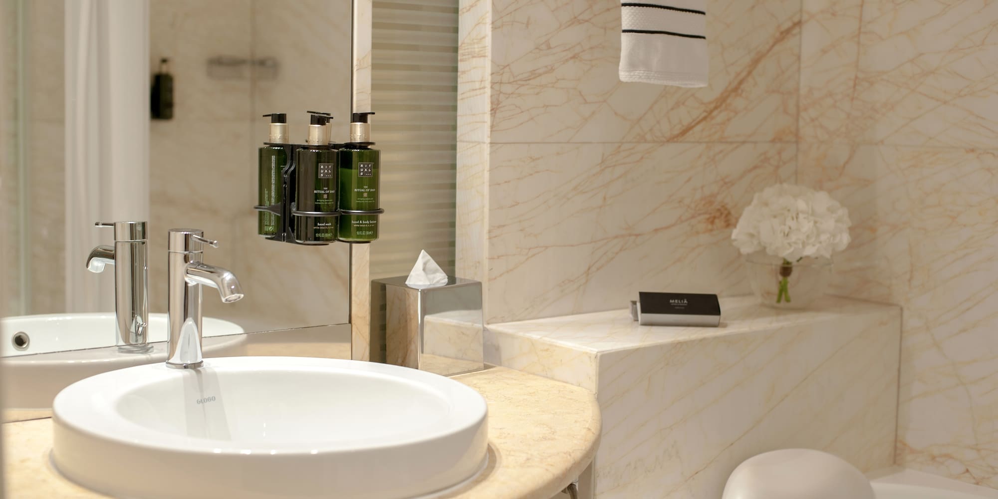 a bathroom with a sink and toilet