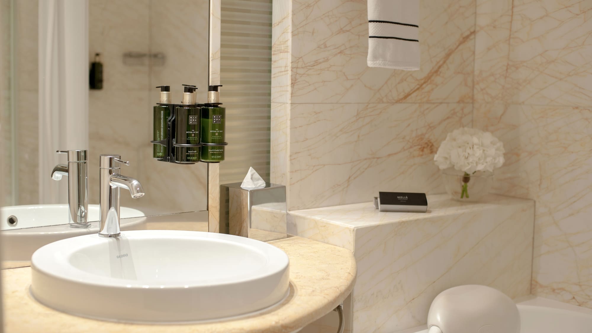 a bathroom with a sink and toilet