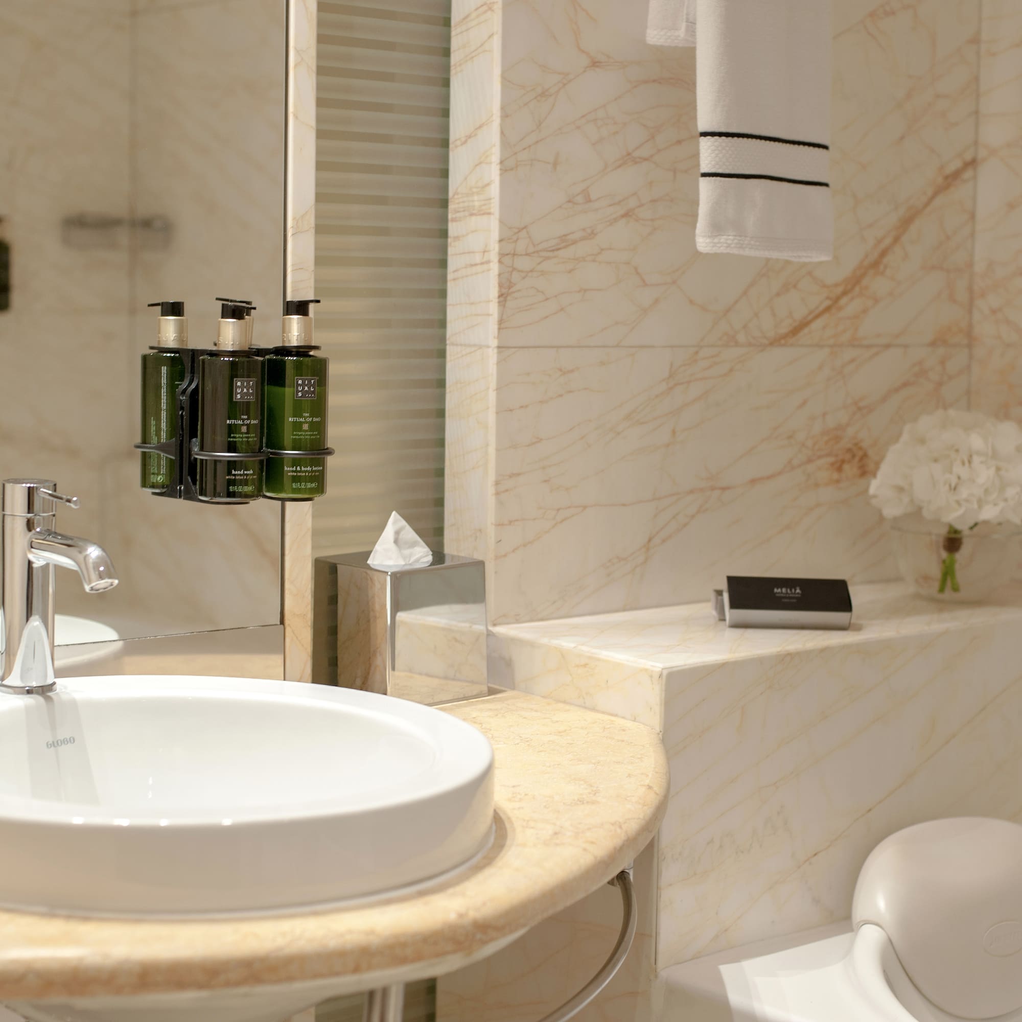 a bathroom with a sink and toilet