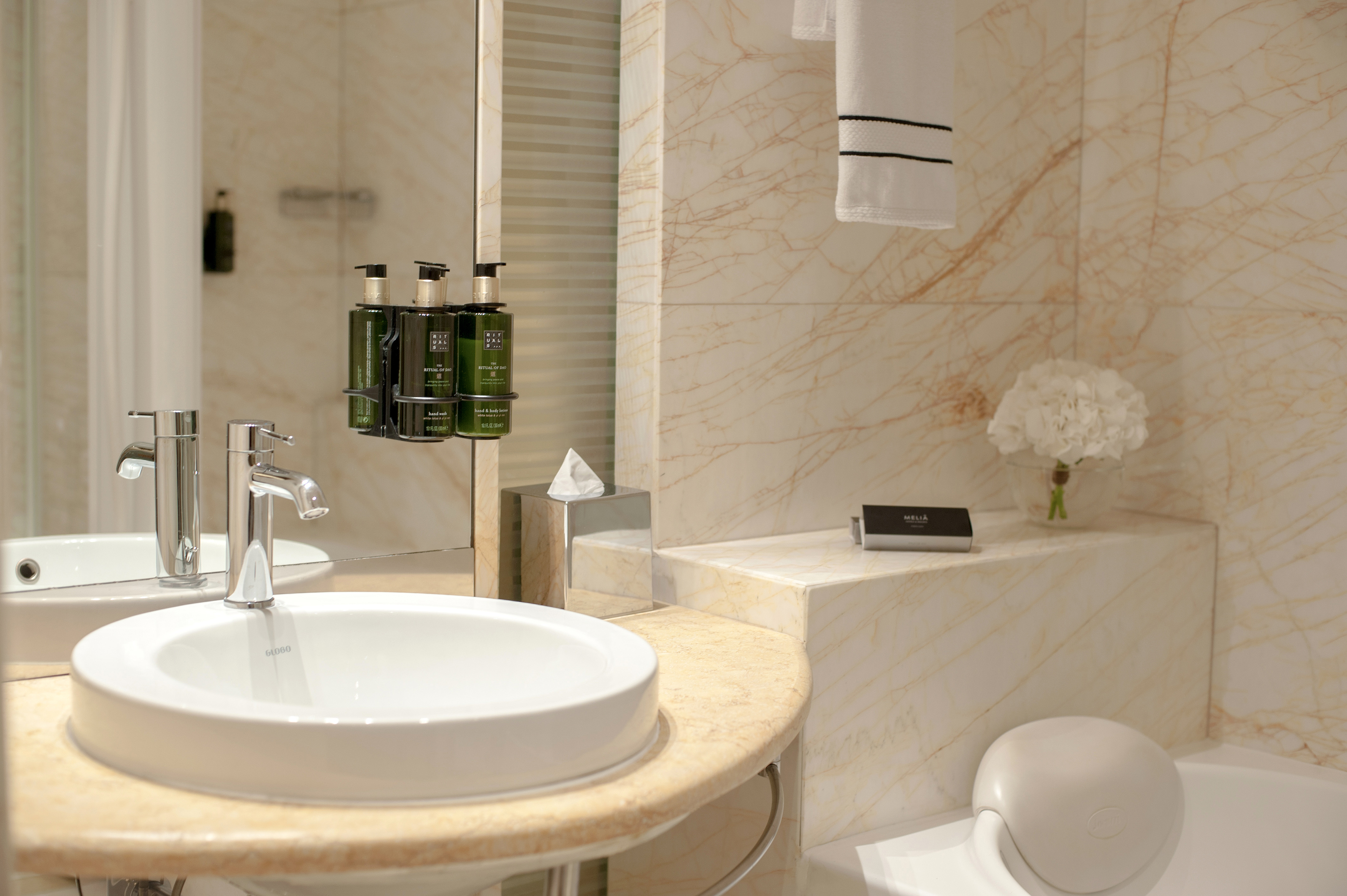 a bathroom with a sink and toilet