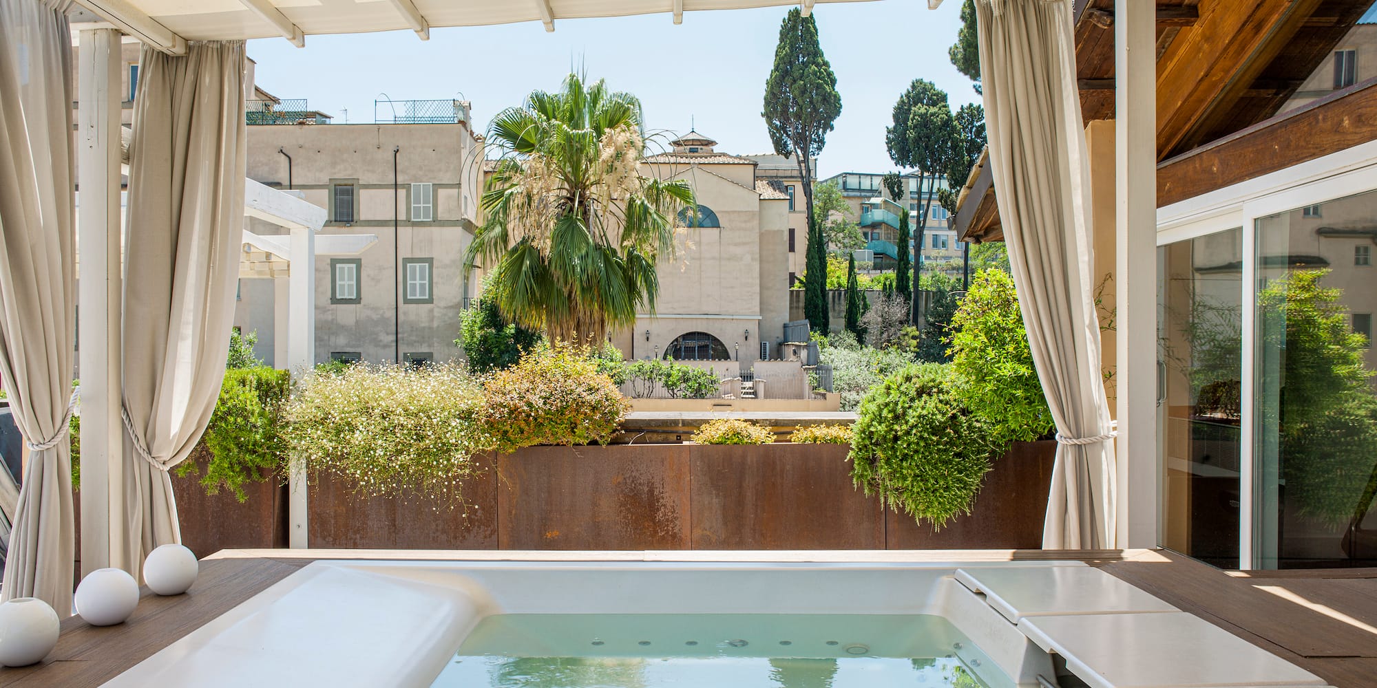 a hot tub with a white cover over it