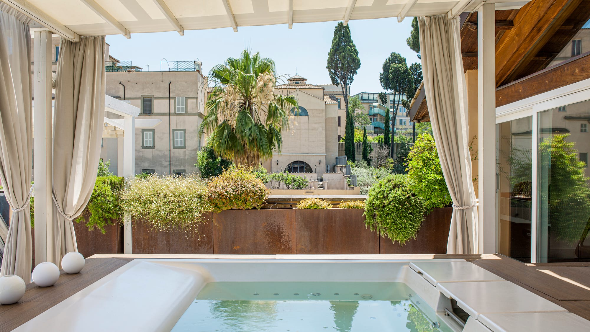 a hot tub with a white cover over it