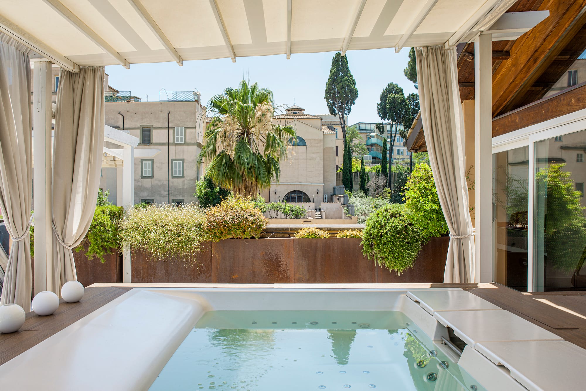 a hot tub with a white cover over it