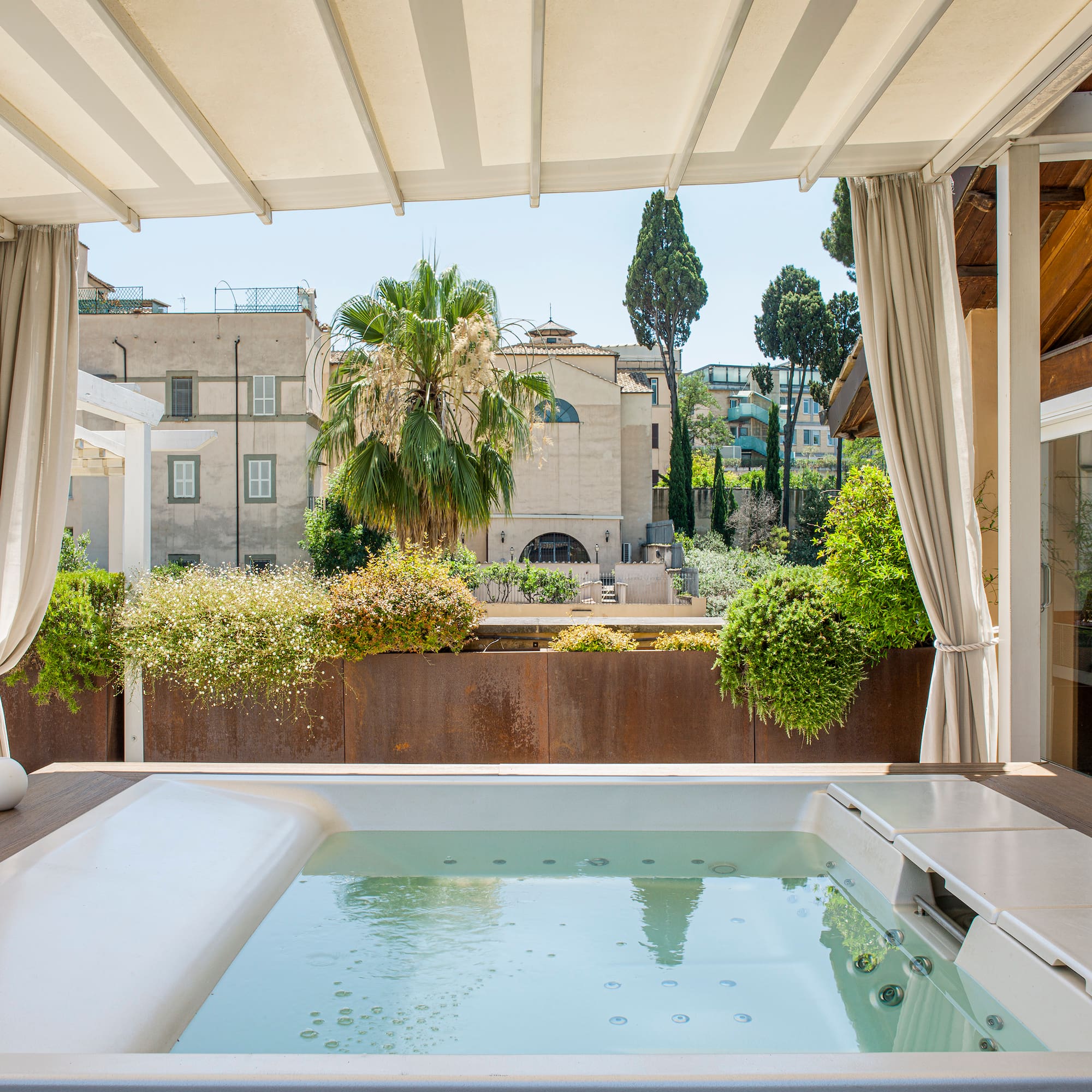 a hot tub with a white cover over it