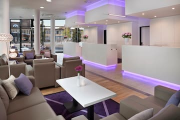 a lobby with purple lighting