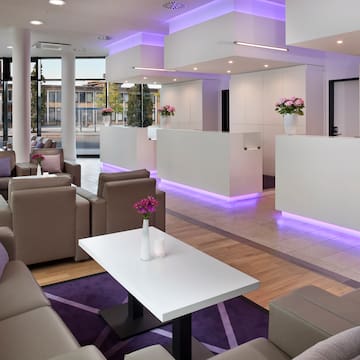 a lobby with purple lighting