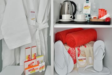 a shelf with towels and towels