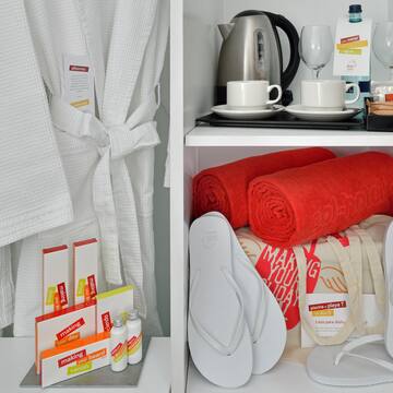 a shelf with towels and towels