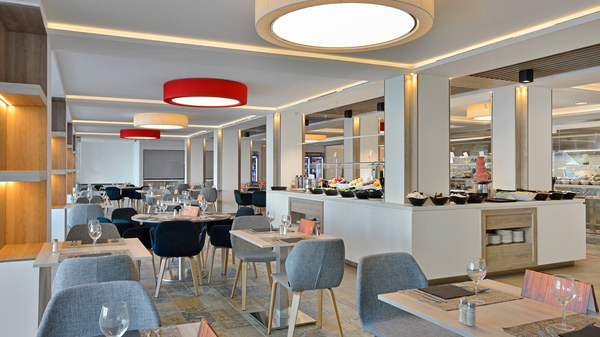 a restaurant with tables and chairs