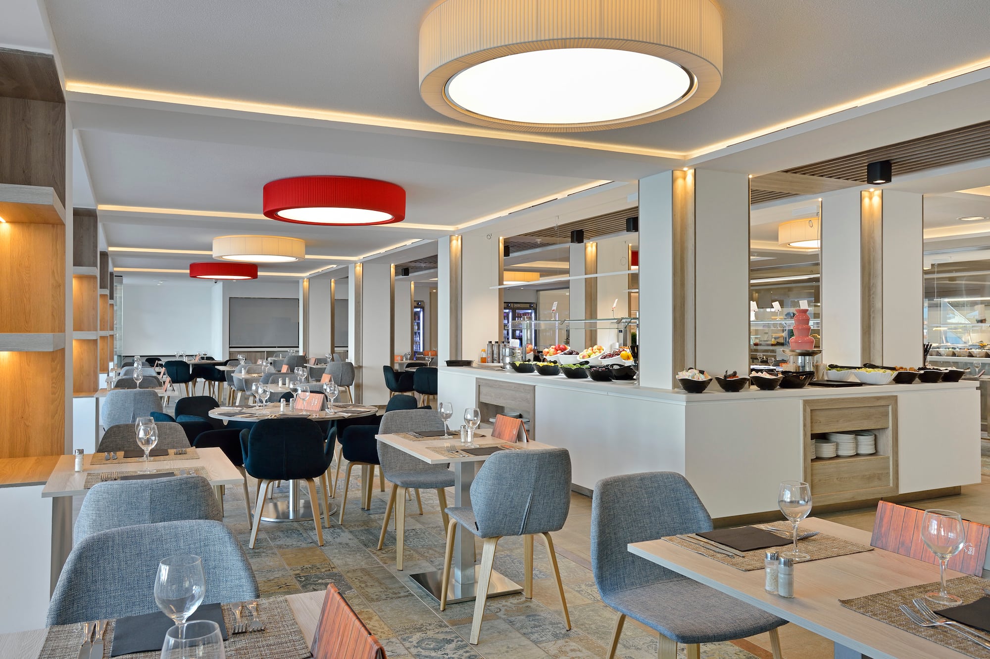 a restaurant with tables and chairs