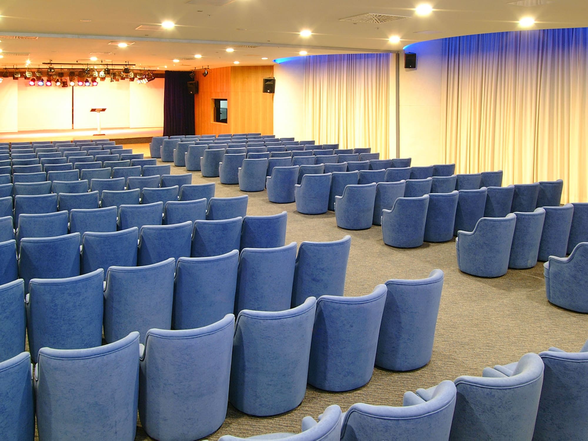 a room with blue chairs