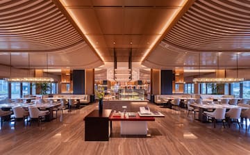 a large room with tables and chairs