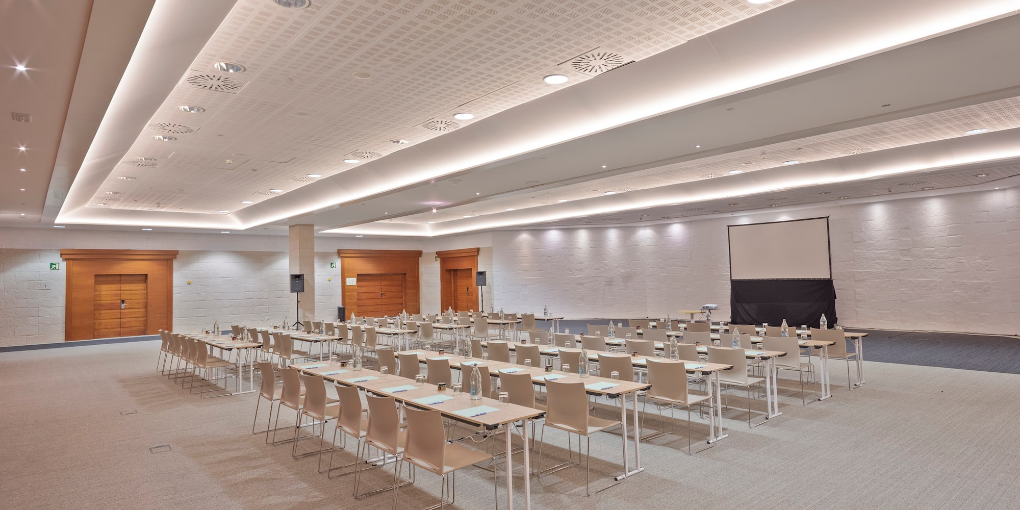 a room with tables and chairs