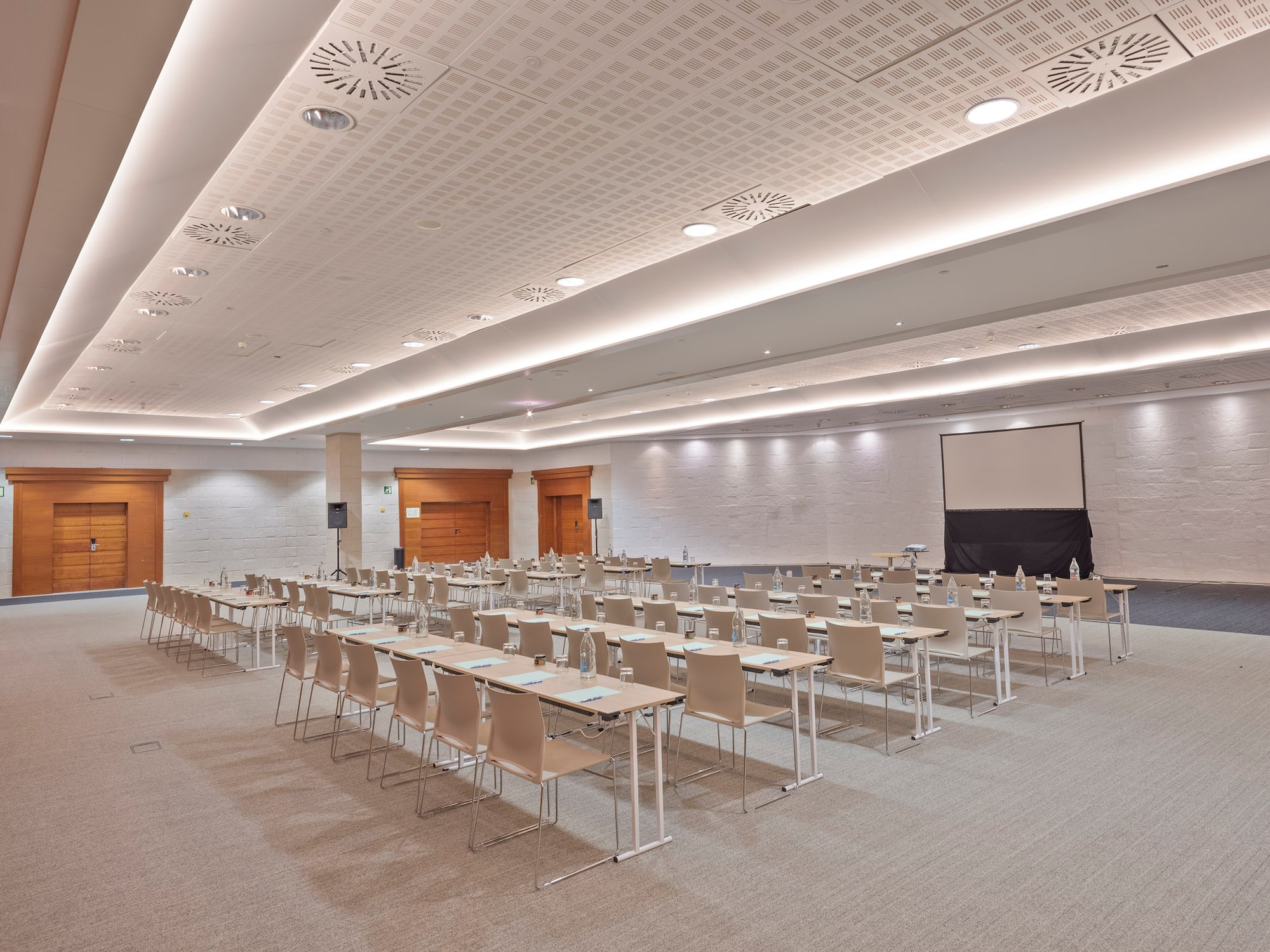 a room with tables and chairs