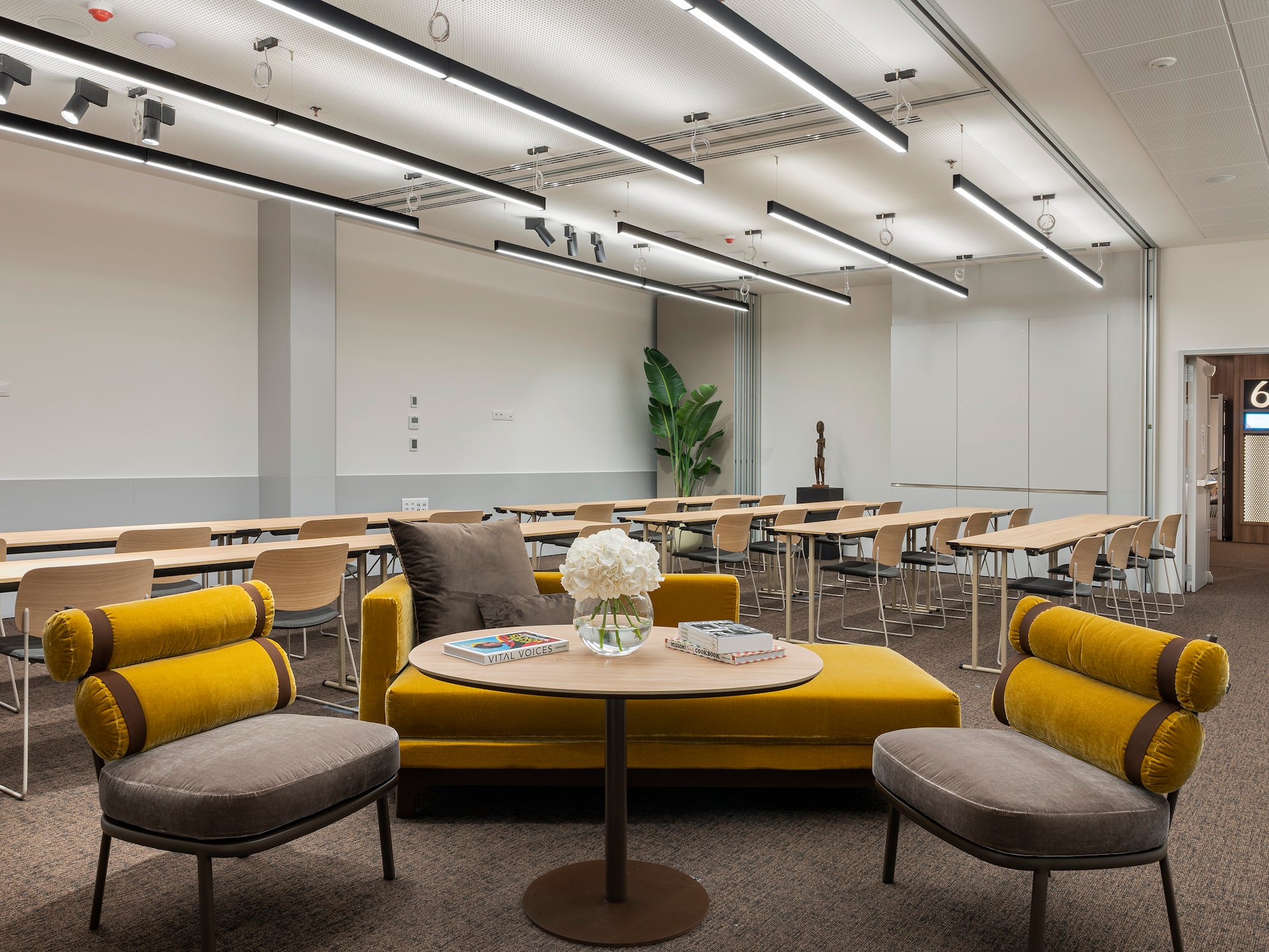 a room with chairs and tables