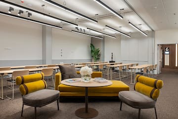 a room with chairs and tables