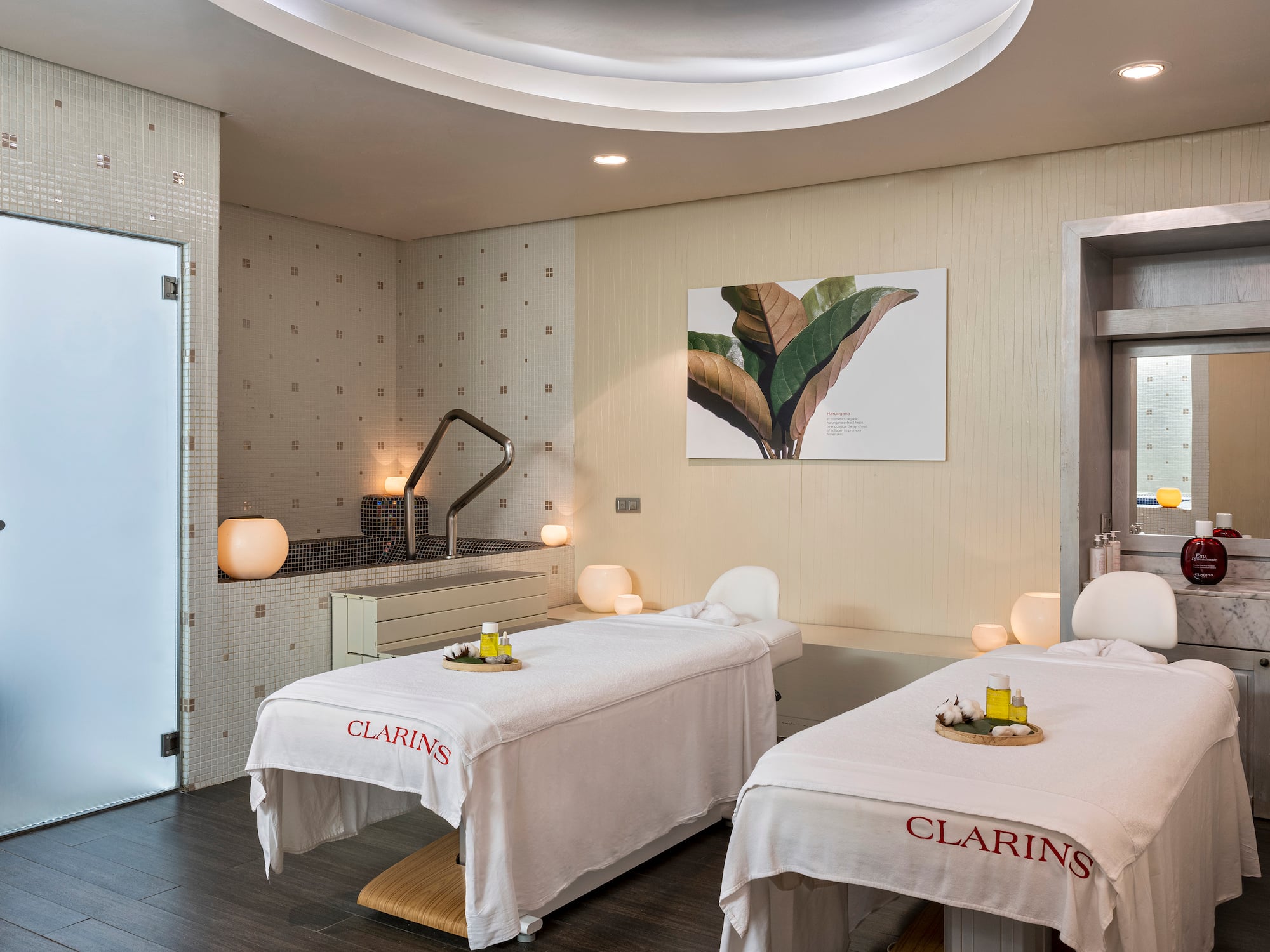 a room with beds and a wall with lights