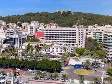 a city with many buildings and a body of water