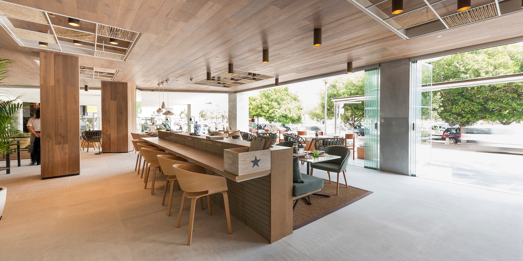 a restaurant with tables and chairs